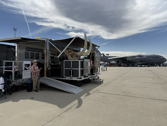 Mobile Museum trailer, with a USAF C-17 in the background.