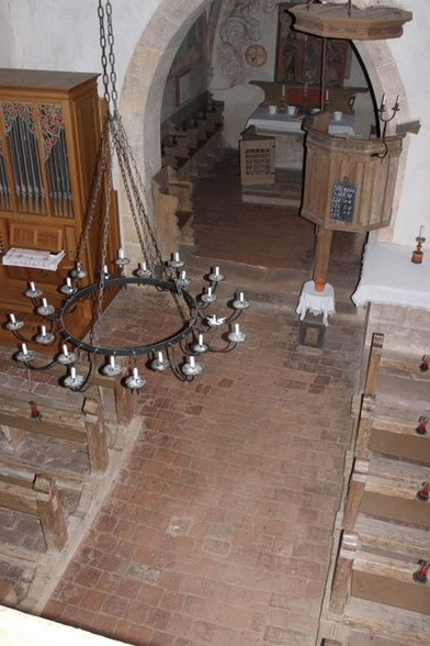 A view into a church, the floor in the centre room is made of Roman tiles