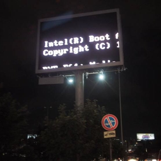 Electronic billboard contains a fragment of an old Intel boot screen.